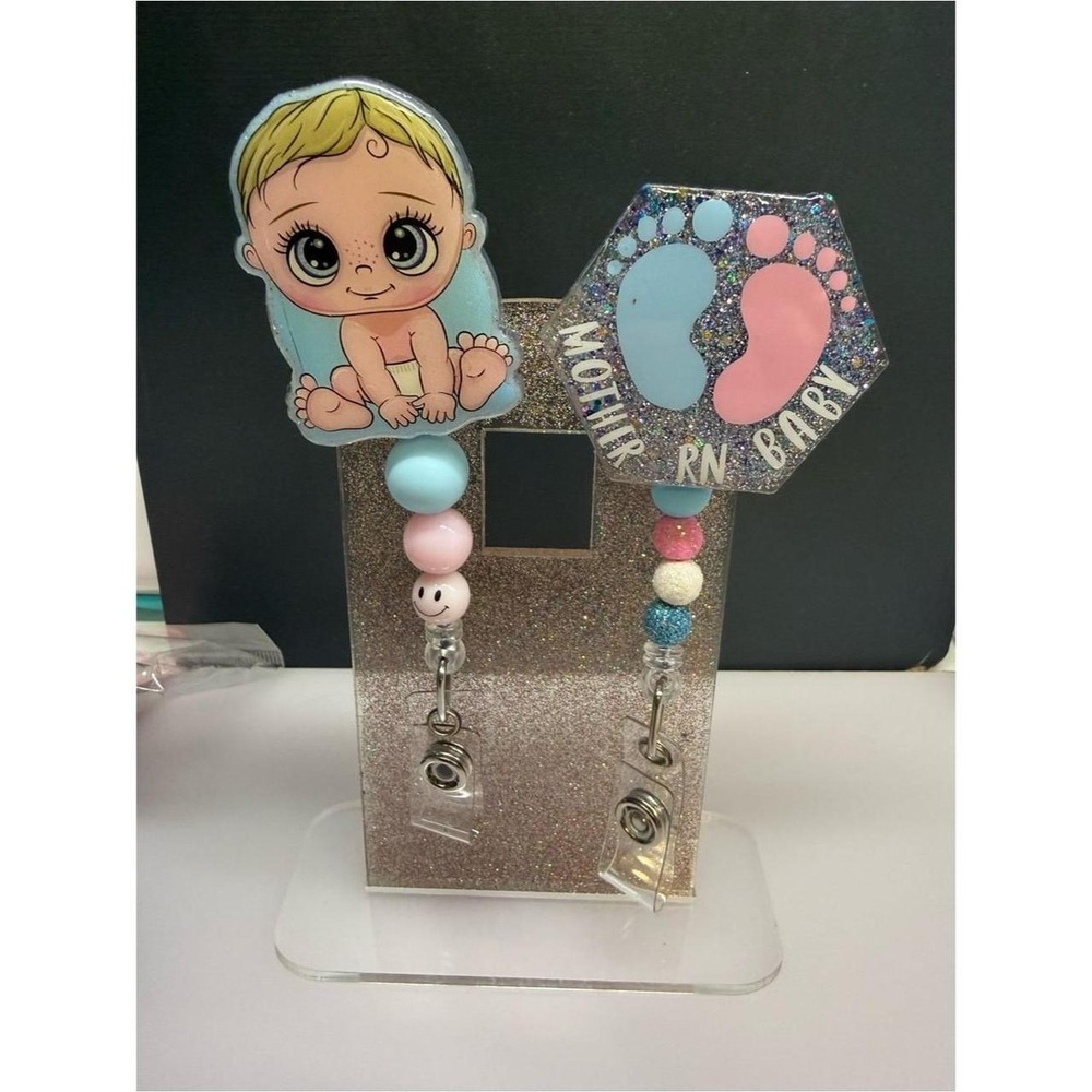 Mother baby badge reel
